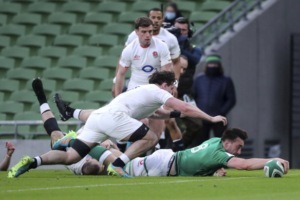 Jack Conan scores a try during Ireland’s 32-18 victory over England on Saturday.