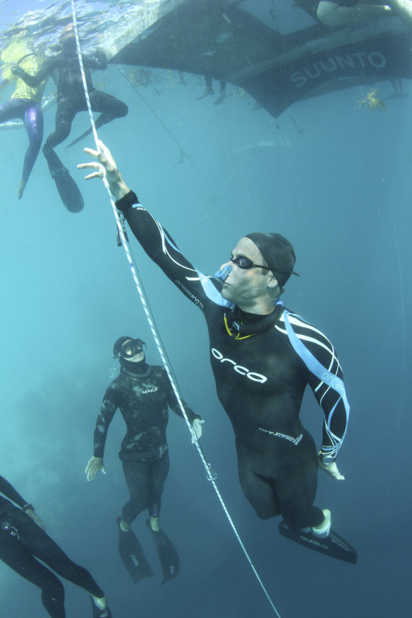 Ant Williams practises for his depth record for diving under the Arctic ice without air or weights.