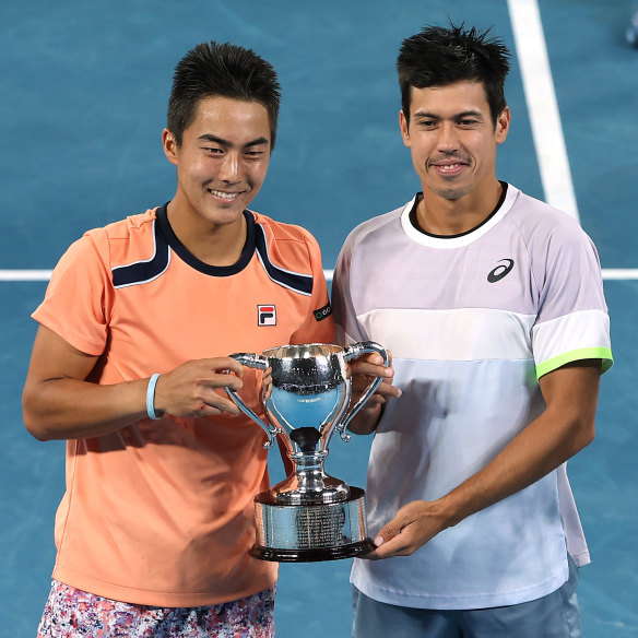 Rinky Hijikata and Jason Kubler of Australia with the men’s doubles trophy at last year’s Australian Open.