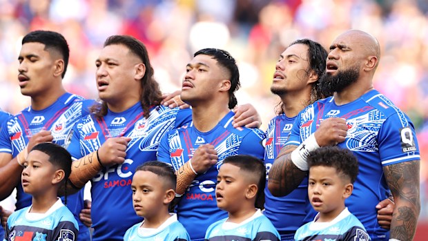 Samoan players sing the national anthem before the Pacific Championships.