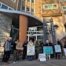 Public housing tower works delayed as activists block tradies from site