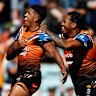 Kai Pearce-Paul celebrates a try in the Tigers’ opening match against North Queensland.