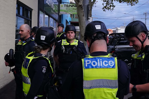 Police outside the fundraising venue in Melbourne