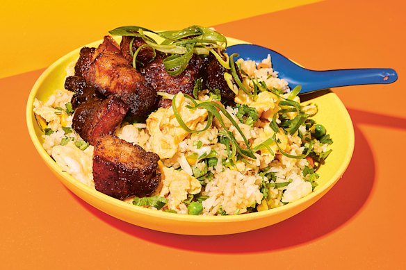 Sticky pork belly adds a special touch to a simple bowl of fried rice.
