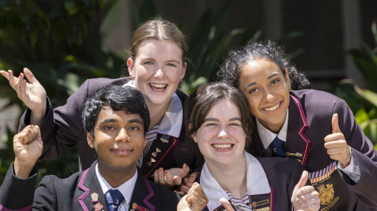Mixing extracurricular activities was the secret to success for Haileybury’s high-achievers Jaeden Vaithainathan, 17, Lucy Gibson, 18, (sitting) and Ashleigh Bell, 18, and Sandy Aurora, 17.
