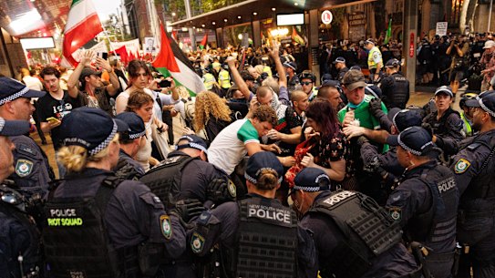 Clashes broke out between police and protesters after some tried to march down George Street following the rally.