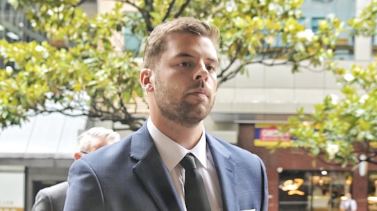 Daniel Keneally enters the Downing Centre court complex on Thursday for his sentencing for fabricating evidence.