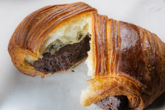 The signature brownie bomb is a brownie-croissant hybrid.