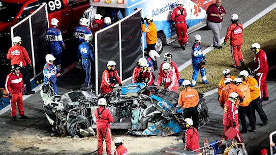 Ryan Newman is removed from the wreckage of his car to be taken to hospital after his crash in the Daytona 500.