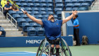 Dylan Alcott of Australia celebrates winning championship point against Niels Vink of the Netherlands during their Wheelchair Quad Singles final match. 