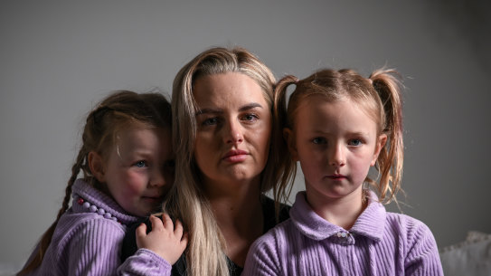 Joanna McNeill and daughters Matilda, aged 7, and Charlee, aged 5. Joanna is living with an incurable and progressive workplace lung condition. 