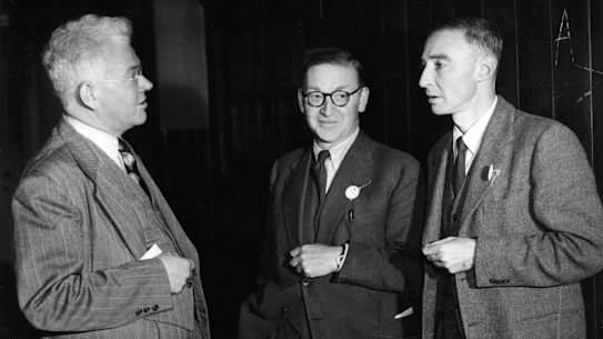 From left:  Mark Oliphant, British scientist John Cockcroft and Robert Oppenheimer in Birmingham, England, in 1948.