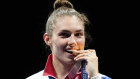 Sofia Pozdniakova of the Russian Olympic Committee after being presented with gold in the women’s individual Sabre  competition on Monday.