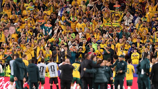 Fans in Santa Clara celebrate the Socceroos' qualification into the round of 32.