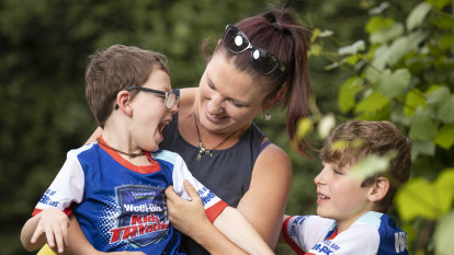 Lucas, 7, can't stand, walk or sit, but he's training for a TRYathlon