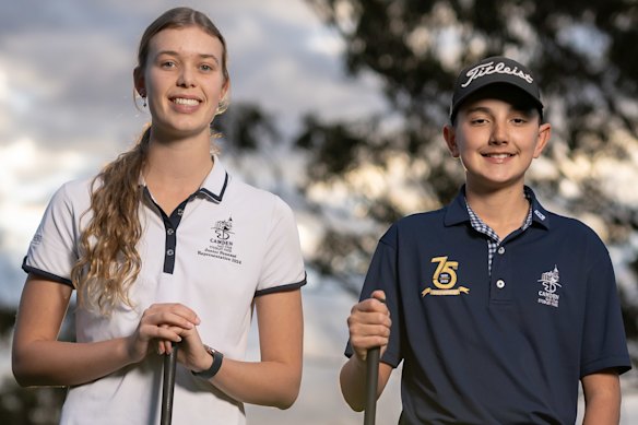 Young golfers Libby Newcombe and Braxton Andrews at Camden Golf Club.