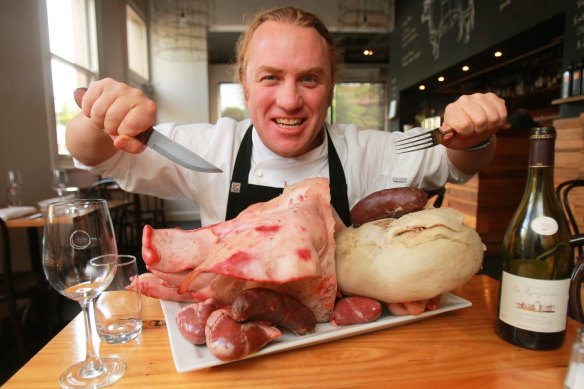 Chef and restaurateur Adrian Richardson with a porcine companion in 2009.