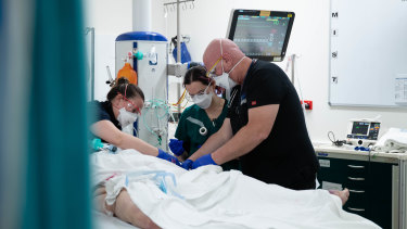 A patient is treated in the St Vincent’s Hospital emergency department.