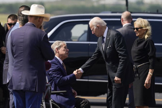US President Joe Biden and first lady Jill Biden meet Governor Greg Abbott, of Texas, ahead of their visit to Robb Elementary School.