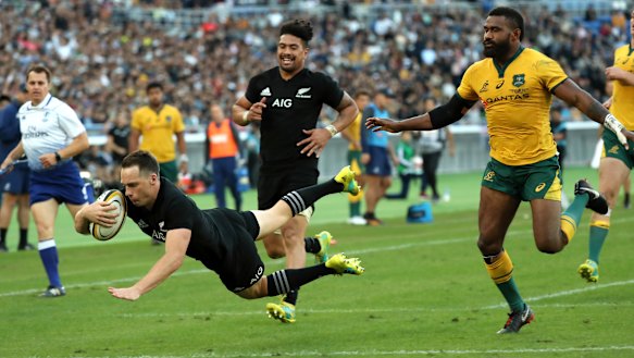 Runaway: New Zealand's Ben Smith scores the All Blacks fourth try against the Wallabies.