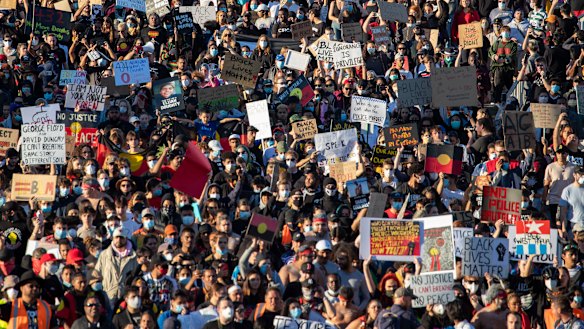 Protesters at Saturday's Black Lives Matter rally in Brisbane.