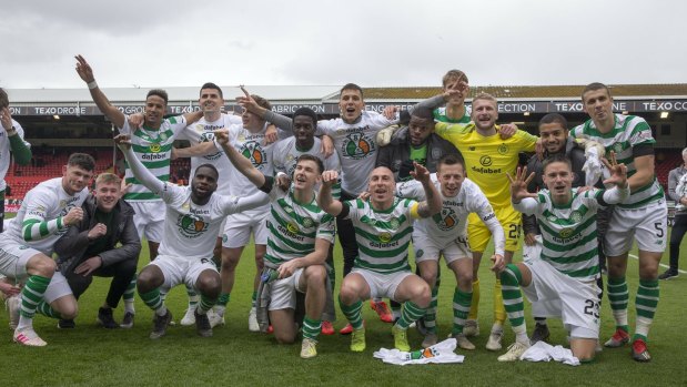 Head and shoulders: Celtic are champions of Scottish football yet again.