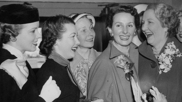 Model Miss  June Dally-Watkins (second from right) and her mother (right) and girls that she taught to model in 1952.