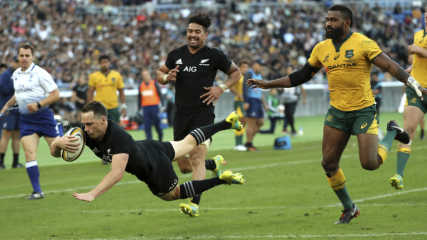 Runaway: New Zealand's Ben Smith scores the All Blacks fourth try against the Wallabies.