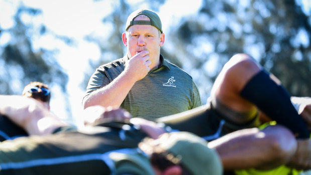 Wallabies scrum coach Petrus du Plessis takes charge of training.