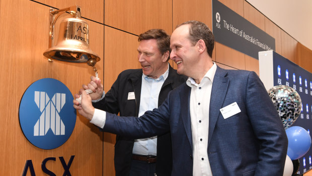Tryo chairman David Thodey and chief executive Robbie Cooke ring the bell at the ASX on Friday in Sydney.
