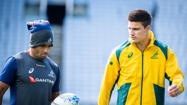 Jack Maddocks (right) chats with Will Genia before a Wallabies Test at Eden Park in 2018. 