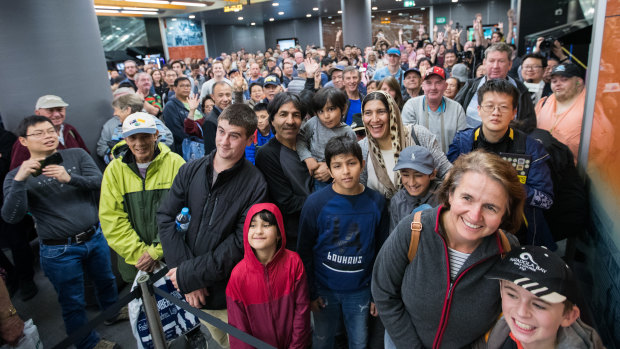 Hundreds of people line up at Chatswood to ride on the first driverless trains.