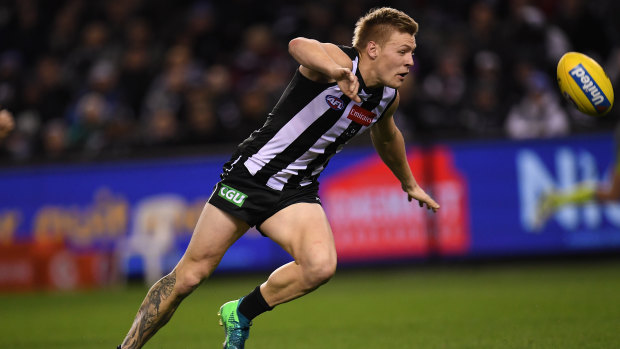Hunting the ball: Jordan De Goey was a star in attack for the Pies.