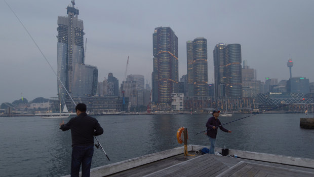 Smoke haze settles in Sydney Harbour.