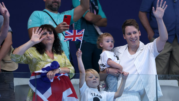 Tom Daley’s mum Debbie, husband Dustin Lance Black and their children show their support at the Paris Aquatics Centre.