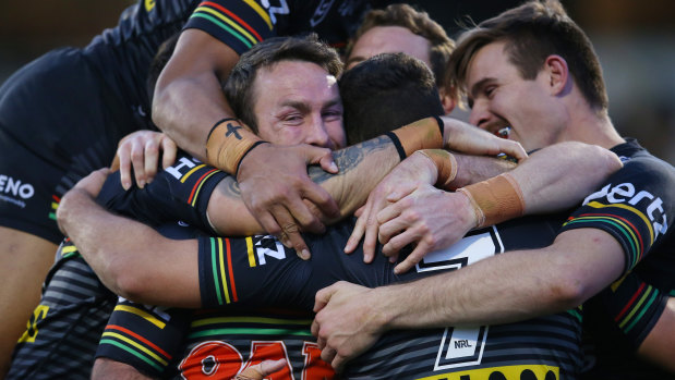 Au revoir, mate: Maloney celebrates with Panthers teammates.