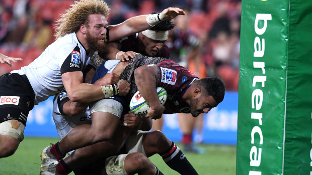 Raw power: Taniela Tupou barges over from close range.