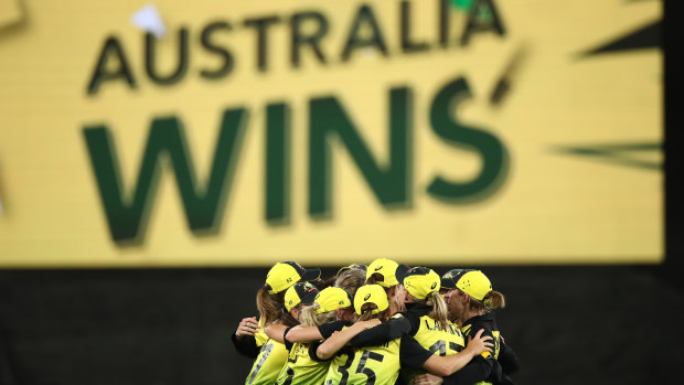 Champion effort: Australia celebrate their historic T20 World Cup victory.
