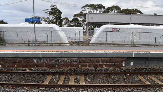 Carriages manufactured in China ready to be assembled in Downer's Newport rail yards.