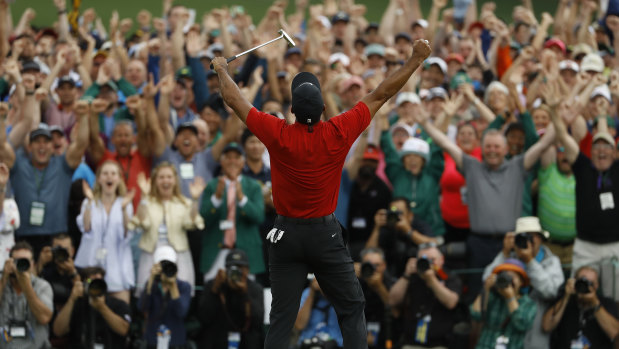 The roar of the crowd resounded around Augusta as Woods' win hit home.