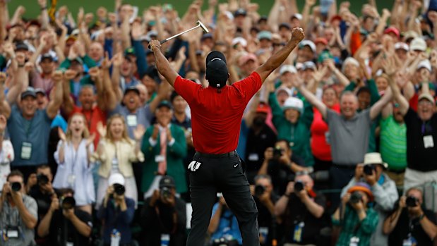 The roar of the crowd resounded around Augusta as Woods' win hit home.