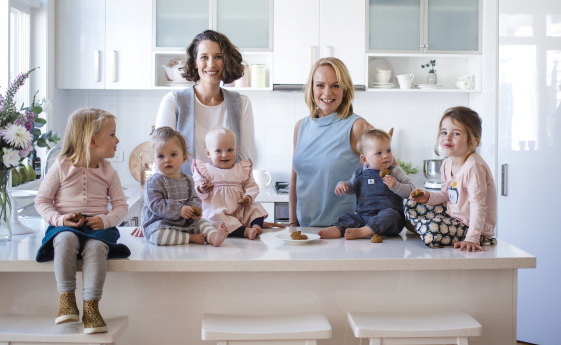 Fran Woods (left) and Jo Clark, the founders of Franjo's Kitchen, with their children. 