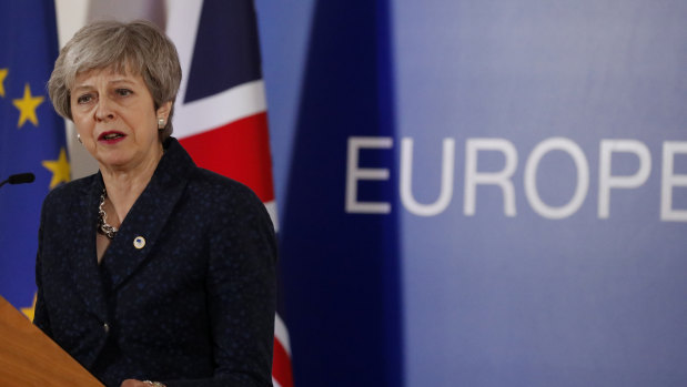 British Prime Minister Theresa May speaks during a media conference at an EU summit in Brussels.