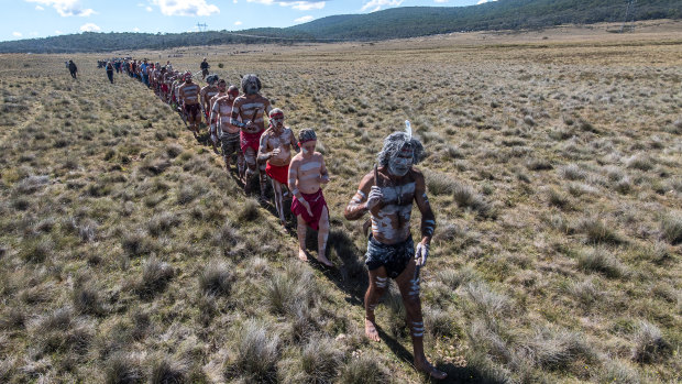 Walking the land: clans on their way to a Narjong ceremony in Kosciuszko National Park.