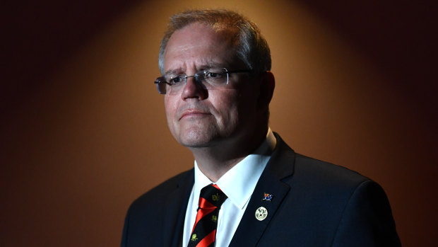 Prime Minister Scott Morrison says he will cut the number of migrants.