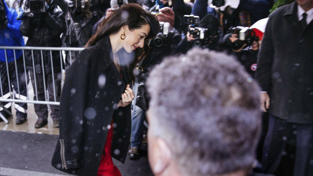 Amal Clooney, human rights lawyer and wife of actor George, attending the shower in a snowy NYC. 