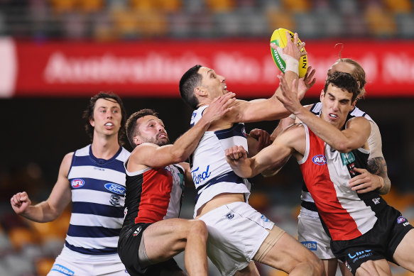 Cats defender Harry Taylor takes a mark against the Saints.