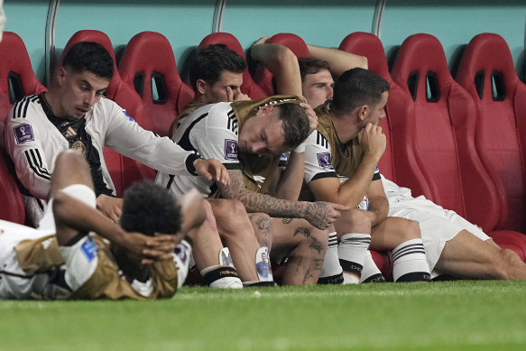 Germany’s bench reacts to their World Cup exit.