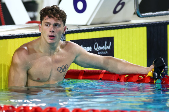 Isaac Cooper on Tuesday night after winning the 100m backstroke.