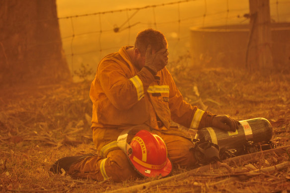 A firefighter in the midst of the blaze raging from Bunyip State Park on Black Saturday.